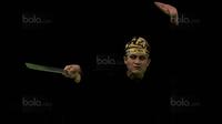 Atlet pencak silat Indonesia, Sugianto, tampil pada kelas seni artistik tunggal di Stadium Juara, Kuala Lumpur, Senin (28/8/2017). Sugianto berhasil meraih perak dengan nilai 462. (Bola.com/Vitalis Yogi Trisna)