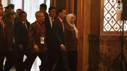 Presiden Joko Widodo saat tiba menghadiri sarasehan 100 ekonom Indonesia di Jakarta, Senin (12/12). (Liputan6.com/Angga Yuniar)