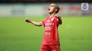Gelandang Persija Jakarta, Riko Simanjuntak, melakukan selebrasi setelah mencetak gol ke gawang Persib Bandung dalam laga tunda pekan ke-28 BRI Liga 1 2022/2023 di Stadion Patriot Candrabhaga, Bekasi, Jumat (31/3/2023). (Bola.com/M Iqbal Ichsan)