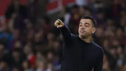 Seperti yang sudah diketahui, Xavi lagi berada dalam masalah besar. Komentarnya terkait keuangan klub dikabarkan membuat Joan Laporta naik pitam. (AP Photo/Joan Monfort)