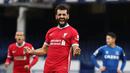 Di posisi 3-5 ditempati oleh gelandang Liverpool, Mohamed Salah. Total pemain asal Mesir ini telah membuat 31 gol dan assist di semua ajang, menyamai dua kompetitornya, Raheem Sterling (Manchester City) dan Son Heung-Min (Tottenham Hotspur). (AFP/Catherine Ivill/Pool)