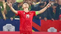 Selebrasi emosional Nguyen Quang Hai usai membobol gawang Timnas Indonesia dalam laga Grup B Piala AFF 2024 di Phu Tho Provincial Stadium, Viet Tri, Minggu (15/12/2024) malam. (Dok. VFF)