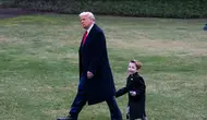 Momen kedekatan Donald Trump dan anak dari Elon Musk ini lantas menuai banyak pujian sekaligus kritik (Dok. AFP/ROBERTO SCHMIDT).