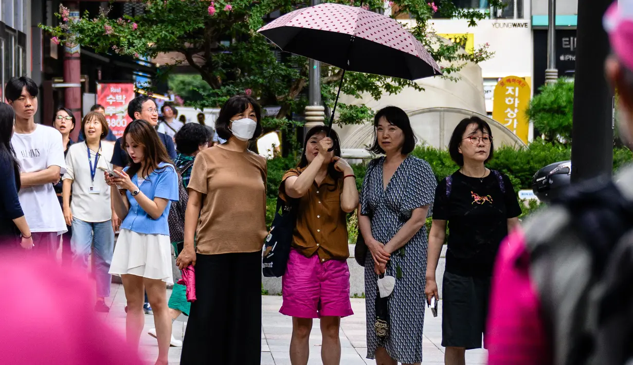 Hingga Rabu (14/8/2024), Seoul tercatat telah mengalami malam tropis ke-24 berturut-turut. (Anthony WALLACE/AFP)