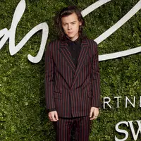 Harry Styles dan personel One Direction lainnya kini dikabarkan akan ‘break’ sementara dan menjalani solo karier. (Bintang/EPA)