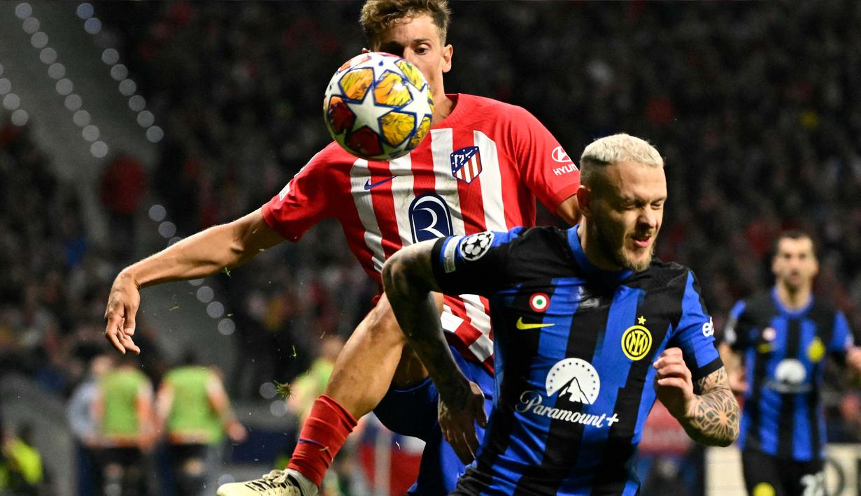 Bermain di markas Atletico Madrid, I Nerazzurri mampu mencetak gol lebih dulu di menit ke-33 melalui aksi Federico Dimarco. (JAVIER SORIANO/AFP)