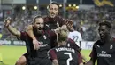 Para pemain AC Milan merayakan gol yang dicetak oleh Gonzalo Higuain ke gawang F91 Dudelange pada laga Liga Europa di StadionJosy Bathel, Letzebuerg, Kamis (20/9/2018). AC Milan menang 1-0 atas F91 Dudelange. (AP/Olivier Matthys)