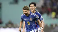 Selebrasi pemain Jepang saat mengalahkan Jerman di Piala Dunia 2022 (AP)