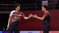 Ganda putra Indonesia Hendra Setiawan/Mohammad Ahsan mengalahkan pasangan Inggris Marcus Ellis/Chris Langridge pada babak pertama Toyota Thailand Open 2021 di Impact Arena, Bangkok, Rabu, 19 Januari. (foto: BWF-limited acces)