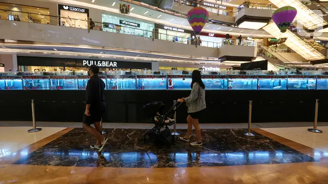 Kontes Kecantikan Ikan Arwana Pikat Pengunjung Mall