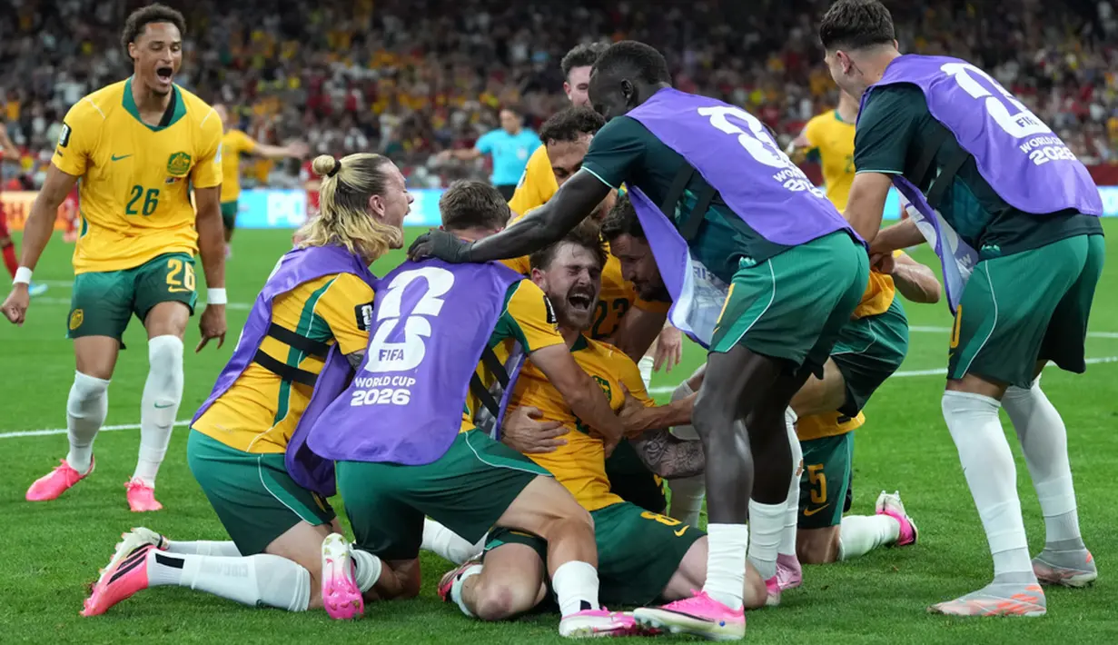 Hasil ini membuat Australia memetik tiga poin dan kini ada di posisi kedua klasemen sementara Grup D Piala Dunia 2026. Sedangkan Turki ada di posisi tiga. (AP Photo/Abbie Parr)