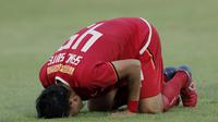 Gelandang Persija Jakarta, Sandi Sute, melakukan selebrasi sujud syukur usai membobol gawang Kalteng Putra pada laga Liga 1 2019 di Stadion Madya, Jakarta, Selasa (20/8). Persija menang 3-0 atas Kalteng Putra. (Bola.com/M Iqbal Ichsan)