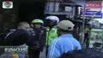 Pemukulan diduga buntut dari perusakan spanduk berisi larangan pengemudi ojek online melintas di wilayah ojek pangkalan.