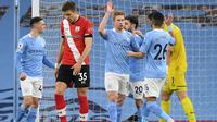 Manchster City meraih kemenangan 5-2 atas Southampton pada laga pekan ke-33 Premier League di Stadion Etihad, Kamis (11/3/2021) dini hari WIB. (AFP/POOL/Gareth Copley)