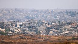 Sedikitnya 151 orang tewas dalam gelombang serangan tanpa henti di seluruh wilayah Palestina tersebut dalam 24 jam pada Minggu 18 Mei 2025. (Menahem KAHANA/AFP)