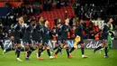 Skor 4-1 bertahan hingga laga usai. PSG yang sebelum laga telah memastikan lolos dari Grup A akhirnya menutup fase grup dengan 11 poin sebagai runner-up, hanya berselisih 1 poin dengan Manchester City sebagai juara grup. (AFP/Anne-Christine Poujoulat)