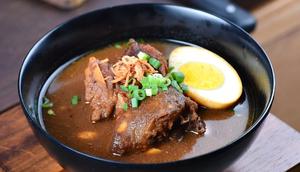 Rawon Ayam Bumbu Instan (created by AI)