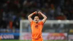 Ekspresi Wesley Sneijder usai mengantarkan Belanda menuju final Piala Dunia 2010. Sneijder memenangkan Silver Boot dengan mencetak lima gol dan satu assist. (AFP/Franck Fife)