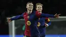 Pemain Barcelona, Fermin Lopez merayakan golnya ke gawang Valencia pada laga lanjutan Liga Spanyol 2024/2025 di Estadi Olimpic Lluis Companys, Barcelona, Spanyol, Senin (27/01/2025) dini hari WIB. (AP Photo/Joan Monfort)
