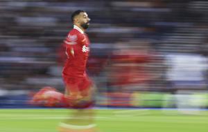 Aksi Mohamed Salah&nbsp;dalam laga Premier League antara Brighton vs Liverpool, Selasa (20/5/2025). (AP Photo/Ian Walton)