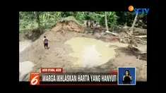 Banjir di desa tersebut terjadi akibat tanggul di kawasan tersebut jebol.
