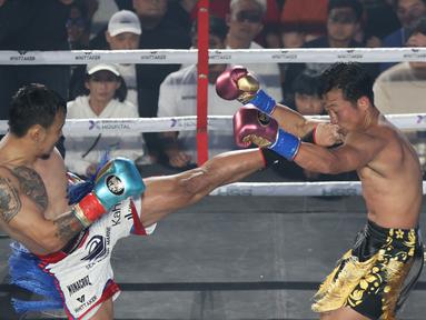 Rudy Golden Boy melepaskan tendangan ke wajah Paris Pernandes dalam ajang HSS Series 7: The Redemption di W Super Club Gatsu, Jakarta, pada Sabtu (7/2/2026). Duel panas tersebut dimenangkan Rudy sekaligus mempertegas rekor 2-0 atas Paris Pernandes. (Bola.com/M Iqbal Ichsan)