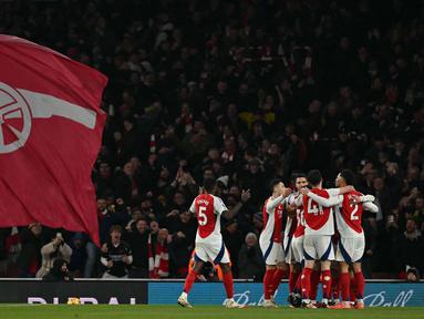 Gelandang Arsenal, Ethan Nwaneri merayakan golnya saat pertandingan sepak bola Liga Premier Inggris melawan Manchester City di Stadion Emirates, London pada 2 Februari 2025. (Glyn KIRK/AFP)