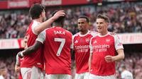 Pemain Arsenal, Viktor Gyokeres (kanan), merayakan gol bersama rekan setimnya dalam pertandingan Liga Inggris melawan Fulham di Emirates Stadium, Inggris, Sabtu (2/5/2026) malam WIB. (AP Photo/Kin Cheung)