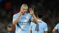 Selebrasi Erling Haaland usai mencetak gol dalam laga Manchester City vs Napoli di Liga Champions 2025/2026, Jumat (19/9/2025). (AP Photo/Dave Thompson)