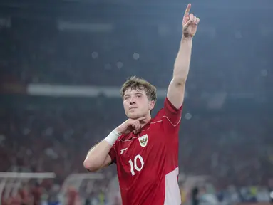 Ekspresi pemain Timnas Indonesia, Ole Lennard Romeny, setelah mencetak gol ke gawang China dalam laga Kualifikasi Piala Dunia 2026 zona Asia di Stadion Utama Gelora Bung Karno (SUGBK) Senayan, Jakarta, Kamis (5/6/2025). (Bola.com/Bagaskara Lazuardi)
