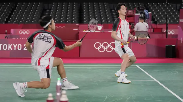 Foto: Kalahkan Pasangan India, Marcus/Kevin Melaju ke Babak Perempatfinal Bulu Tangkis Ganda Putra Olimpiade Tokyo 2020