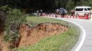 Lokasi tanah longsor di pertanian organik di Batang Kali, Malaysia, Jumat, 16 Desember 2022. Puluhan warga Malaysia diyakini sedang berada di perkemahan wisata di Batang Kali, di luar ibu kota Kuala Lumpur, ketika Insiden itu terjadi, kata seorang kepala polisi distrik. (AP Photo/FL Wong)