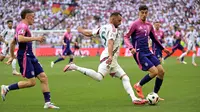 Sementara Ilkay Gundogan mengunci kemenangan Jerman di babak kedua. (Fabrice COFFRINI / AFP)