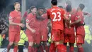 Para pemain Liverpool merayakan gol Sadio Mane (2kanan) saat melawan Everton pada Derby Merseyside di Goodison Park, Liverpool, (19/12/2016). Liverpool menang 1-0. (AFP/Oli Scarff)