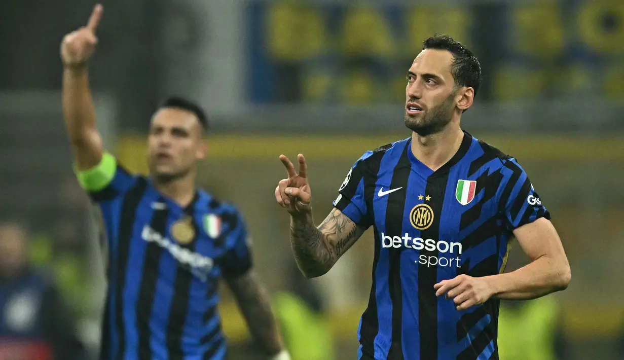 Il Nerazzurri akhirnya memecah kebuntuan lewat gol yang dicetak Hakan Calhanoglu dari titik putih pada menit ke-45+3. (Gabriel BOUYS/AFP)