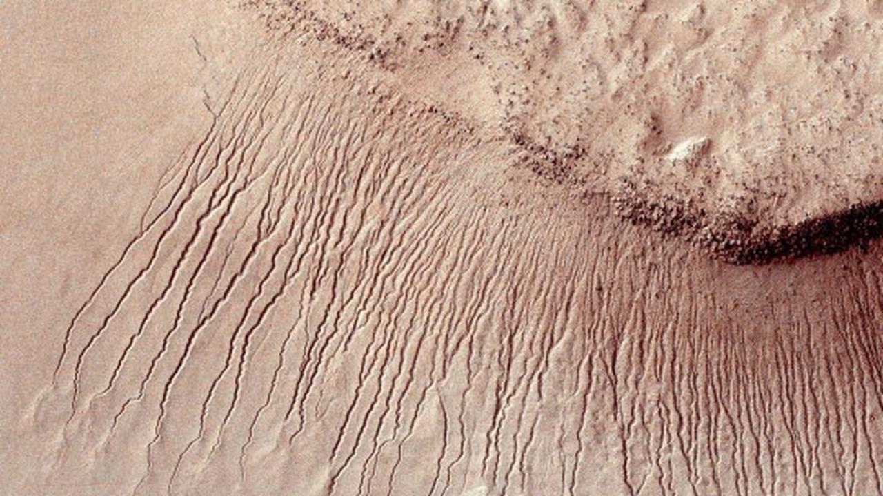 Ini wujud permukaan Mars yang dibentuk oleh air