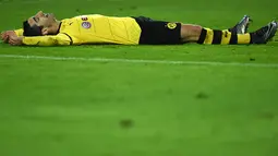 2. Henrikh Mkhitaryan, mantan gelandang Donetsk ini penampilannya kurang memuaskan ketika Dortmund dilatih Klopp. Namun musim ini saat Dortmund dilatih Thomas Tuchel, dirinya bersinar dengan menorehkan 9 gol serta 10 assist. (AFP/Patrik Stollarz)
