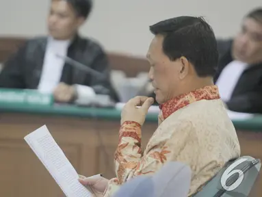 Didik Purnomo menjalani sidang perdana di Pengadilan Tipikor, Jakarta, Kamis (11/12/2014). (Liputan6.com/Andrian M Tunay)
