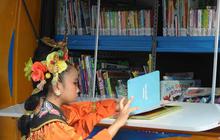 FOTO: Perpustakaan Keliling Ajak Anak-Anak Giat Membaca