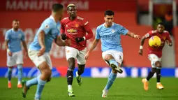 Diboyong ke Etihad dengan harga 70 juta euro, Rodri berhasil menjadi pemain kunci di lini tengah Manchester City. Ia mampu tampil konsisten dan efisien dengan menorehkan akurasi umpan sebesar 92,4% di Liga Inggris. Rodri juga berhasil menyumbangkan 2 gol dan 1 assist sejauh ini. (AFP/Paul Ellis)