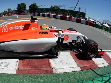 Pebalap Spanyol Roberto Merhi dari F1 Team  Manor Marussia saat kualifikasi untuk Formula 1 Grand Prix 2015, Kanada 6 Juni 2015. Pebalap Indonesia, Rio Haryanto, akan tampil bersama Manor Racing dalam balapan Formula 1 tahun ini. (AFP PHOTO / DON Emmert)