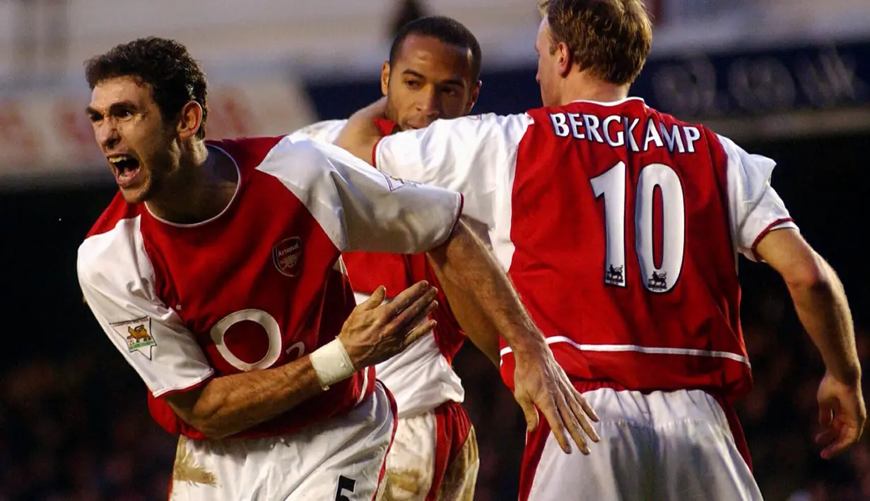 Martin Keown yang pensiun pada Agustus 2012 bersama Wembley FC tercatat pernah membela Arsenal dalam dua periode, 1983/1984 hingga 1985/1986 dan 1992/1993 hingga 2003/2004. Bersama Timnas Inggris ia total mengoleksi 43 caps dan pernah satu kali menjabat kapten Three Lions saat bermain imbang 0-0 dengan tuan rumah Finlandia pada laga Grup 9 kualifikasi Piala Dunia 2002 (11/10/2000). (AFP/Nicolas Asfouri)