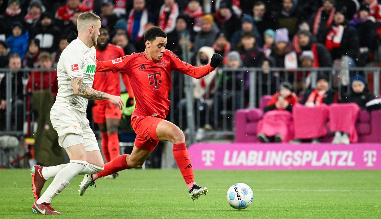 Bayern Munchen berhasil meraih kemenangan meyakinkan atas Augsburg 3-0 dalam pertandingan pekan ke-11 Bundesliga. (AFP/Lukan Barth-Tuttas)