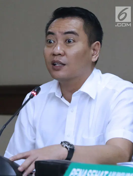 Terdakwa dugaan suap proyek Bakamla, Fayakhun Andriadi saat menjalani sidang lanjutan di Pengadilan Tipikor, Jakarta, Rabu (19/9). Sidang mendengar keterangan saksi Irvanto Hendra Pambudi, (Liputan6.com/Helmi Fithriansyah)