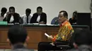 Muhtar Ependy merupakan perantara, saat Akil menerima suap dari Romi Herto, terkait penanganan perkara Pilkada Walikota Palembang periode 2014-2019 di MK. (Liputan6.com/Miftahul Hayat)