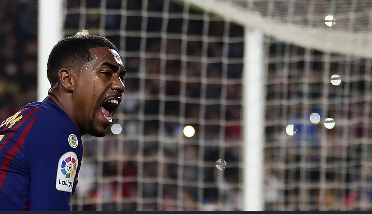 Striker Barcelona, Malcom, melakukan selebrasi usai mencetak gol ke gawang Cultural Leonesa pada laga Copa del Rey di Stadion Camp Nou, Rabu (5/12). Barcelona menang 4-1 atas Cultural Leonesa. (AP/Manu Fernandez)