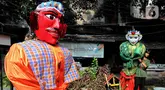 Aktivitas pengamen ondel-ondel di salah satu permukiman warga di Jakarta, Jumat (30/5/2025). (Liputan6.com/Angga Yuniar)