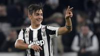 Ekspresi pemain Juventus, Paulo Dybala usai membobol gawang Spal pada lanjutan Serie A di Allianz Stadium, Turin, (25/10/2017). Juventus menang 4-1. (AFP/Miguel Medina)