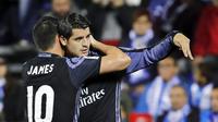 Alvaro Morata (kanan) saat merayakan gol bersama rekannya  James Rodriguez (L) pada laga La Liga melawan CD Leganes di Butarque stadium, Madrid, (5/4/2017). ( EPA/Juanjo Martin)