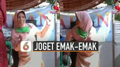 Berjoget dengan percaya diri saat pemusik sedang menyanyikan lagu dangdut.